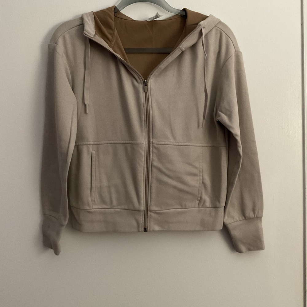 Beige Zip-Up Hoodie with Brown Lining